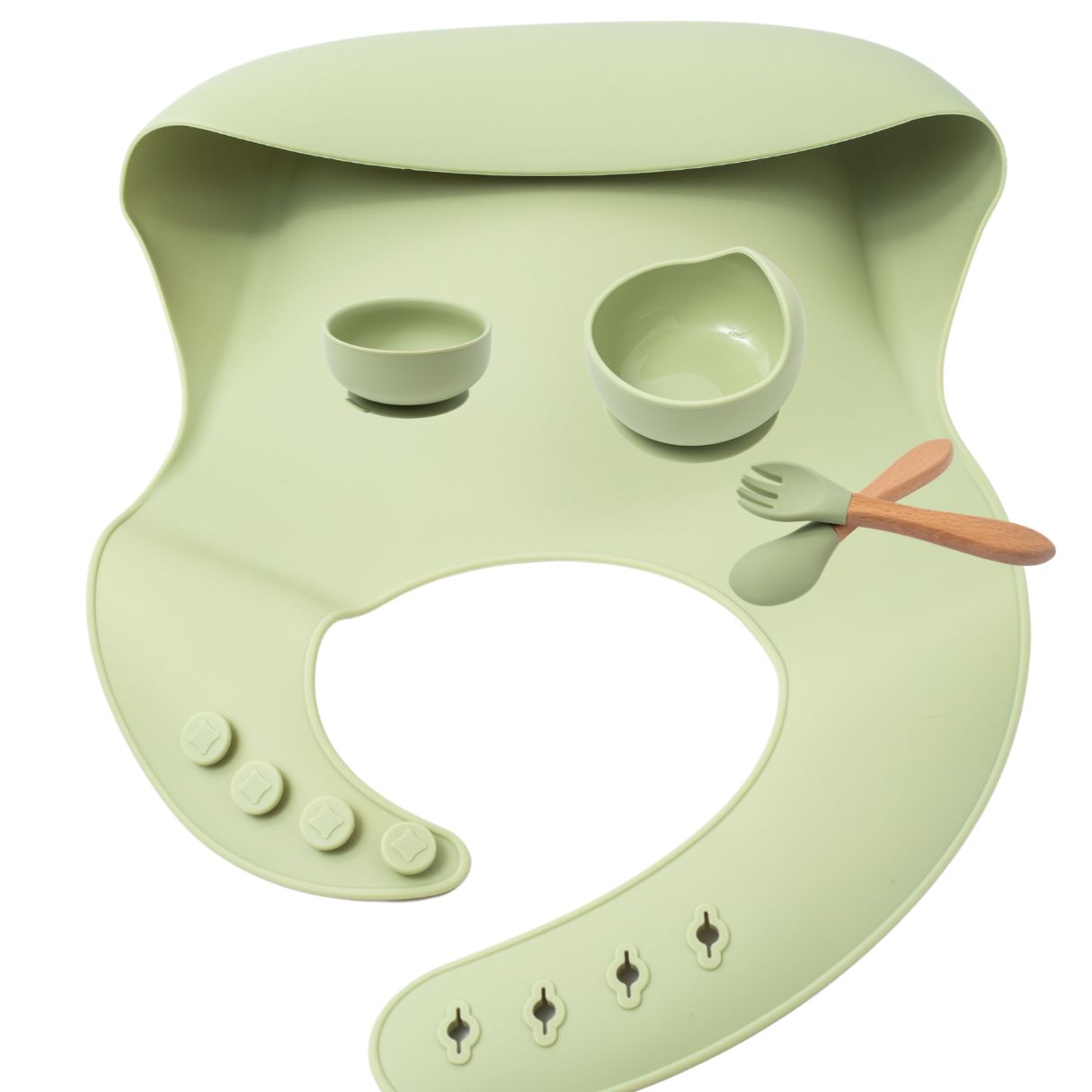 Silicon baby feeding dinner set having weaning bowl round bowl bib spoon and fork in green color