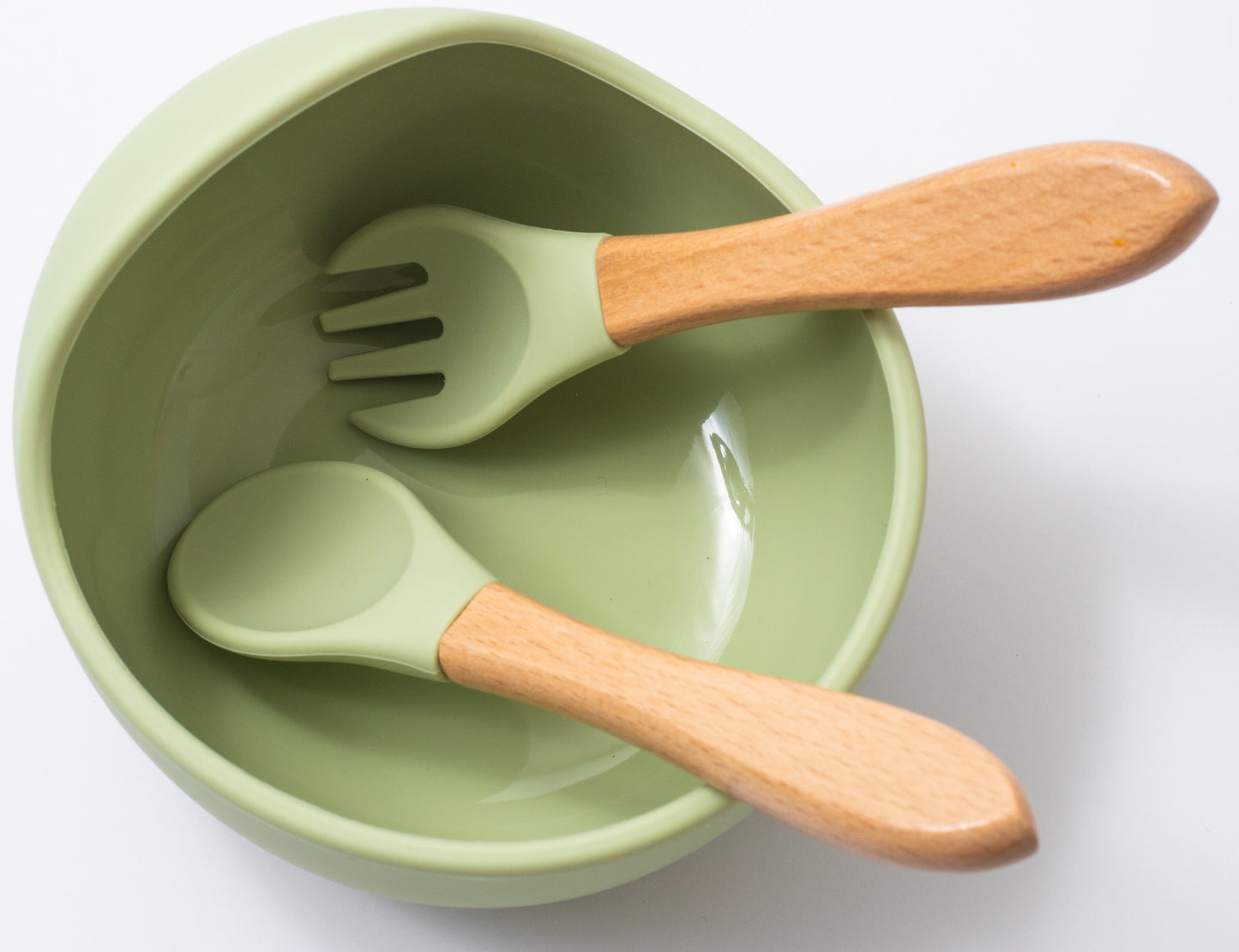 silicon weaning bowl with spoon and fork in green color