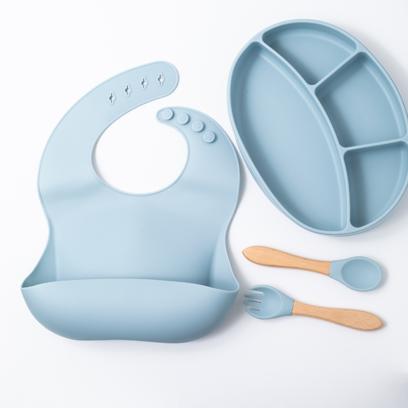 silicon baby feeding  spoon fork sectioned plate and bib in blue color