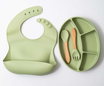 silicon baby feeding  spoon fork sectioned plate and bib in green color