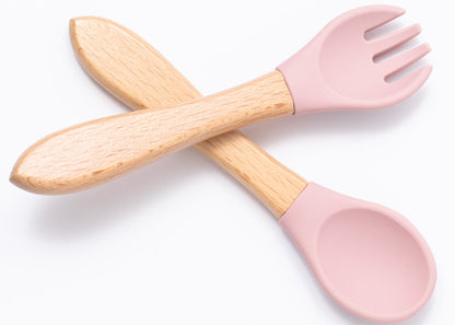 Silicon baby feeding spoon and fork in pink color